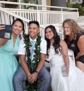 Maui wedding planner with couple at Sugar Beach Events