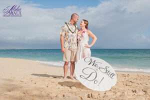 Couple chooses to renew vows in Hawaii on the beach with Vow Renewal props